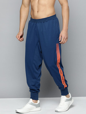 HRX by Hrithik Roshan Solid Men Blue Track Pants