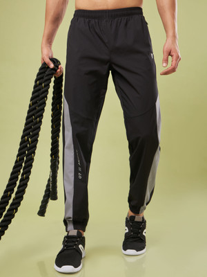TECHNOSPORT Solid, Striped Men Black Track Pants