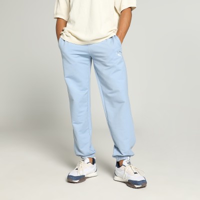 PUMA Solid Men Blue Track Pants