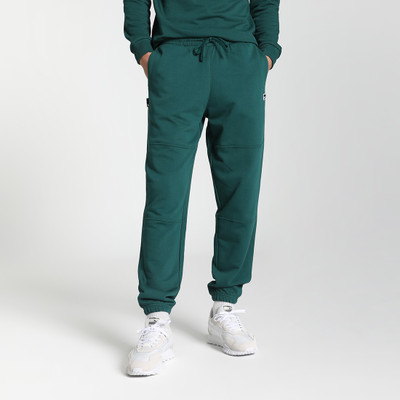 PUMA Solid Men Green Track Pants