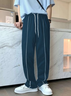 LOTHRIC Self Design Men Blue Track Pants