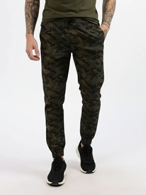 24 Street Solid Men Green Track Pants