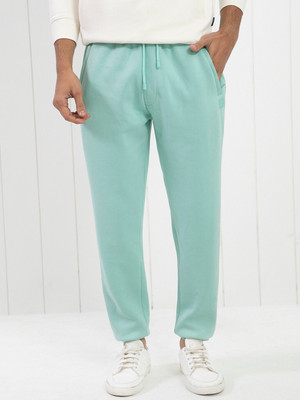 Rare Rabbit Solid Men Green Track Pants