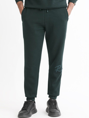 Rare Rabbit Solid Men Green Track Pants