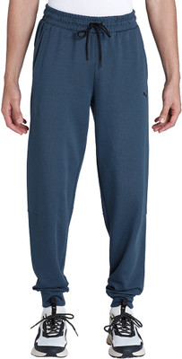 PUMA Solid Men Blue Track Pants