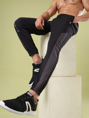 TECHNOSPORT Solid, Striped Men Black Track Pants