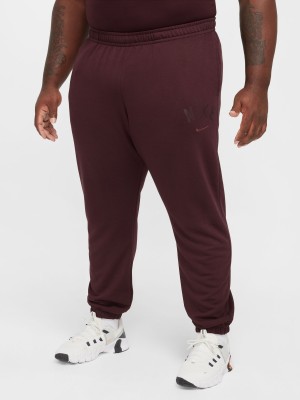 NIKE Solid Men Brown Track Pants