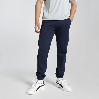 PUMA Solid Men Blue Track Pants