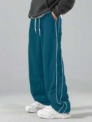 Rajovati Solid Men Green Track Pants