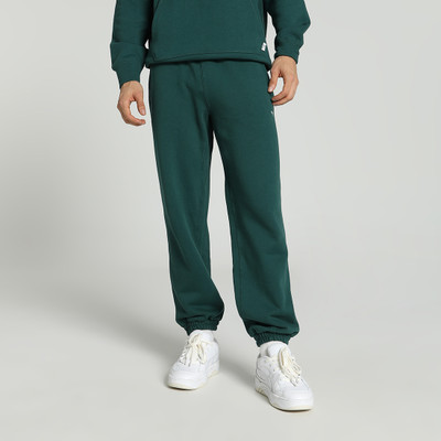 PUMA Solid Men Green Track Pants