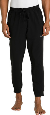 PUMA M STUDIO ULTRAMOVE JOGGER Solid Men Black Track Pants