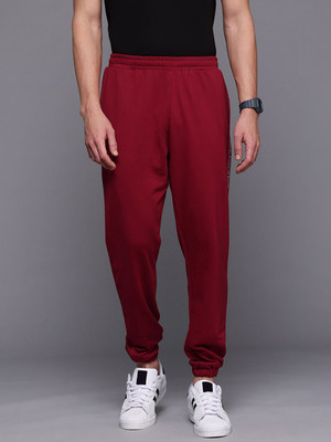 HRX by Hrithik Roshan Solid Men Maroon Track Pants