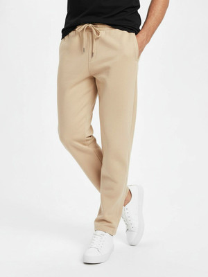 Glitchez Solid Men Beige Track Pants