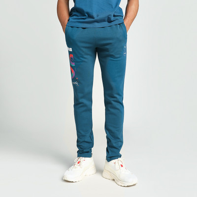 PUMA Solid Men Blue Track Pants