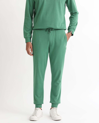 Rare Rabbit Solid Men Green Track Pants