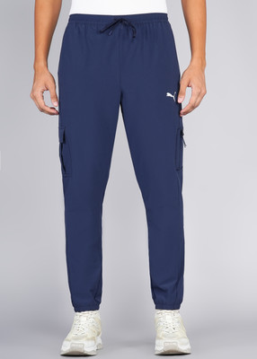 PUMA Solid Men Blue Track Pants