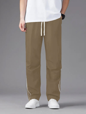 Rajovati Solid Men Beige Track Pants