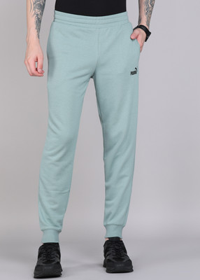 PUMA Solid Men Green Track Pants