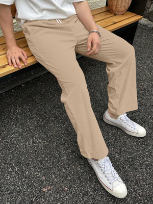 Rajovati Loose Fit Men Cream Trousers