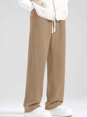 Rajovati Loose Fit Men Cream Trousers