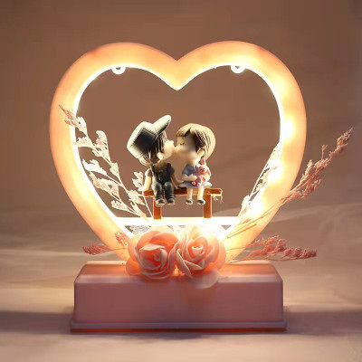 Chocozone Musical Couple Showpiece with Lights Birthday Gifts for Girls Romantic Gifts Decorative Showpiece  -  16 cm(Plastic, Pink)