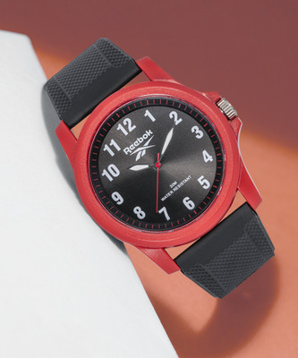 REEBOK NEAT Analog Watch – For Men RV-NAT-G2-PRPB-BR For Rs. 899 @ 70 %