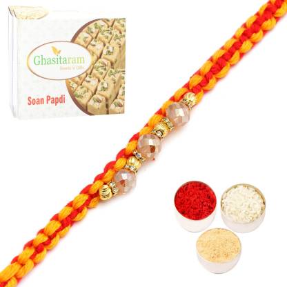 Ghasitaram Gifts The Glittering Thread rm584 Bracelet Rakhi with 200 gms of Soan Papdi Combo