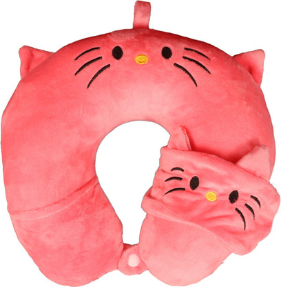 sleeping with a travel pillow in bed
