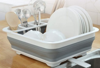 Sectional Cutlery and Utensil Compartment Collapsible Dish Drying Rack Drain Water Directly into the Sink Popup and Collapse for Easy Storage Compact and Portable. Room for Eight Large Plates 