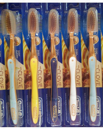 oral b clove extract toothbrush