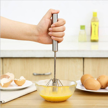 spins beater to mix food