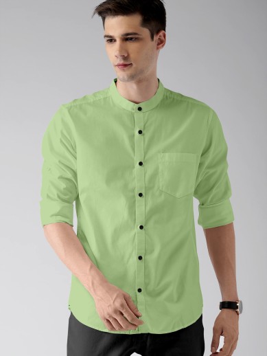 light green shirt and black pants