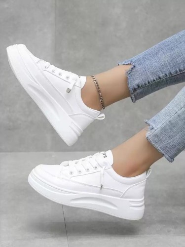 12 Under-$100 White Sneakers That Are Perfect for Travel