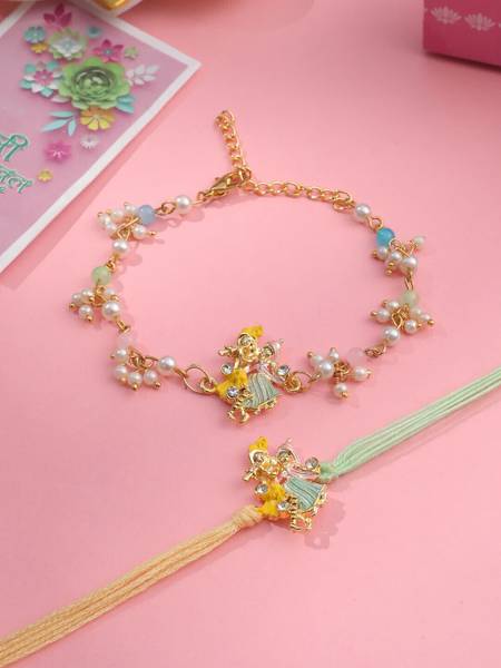 NVR Bhaiya Bhabhi Radha Kishan Bhaiya Bhabhi Rakhi Set Gold Finish, Kundan, Assorted Rakhi Set