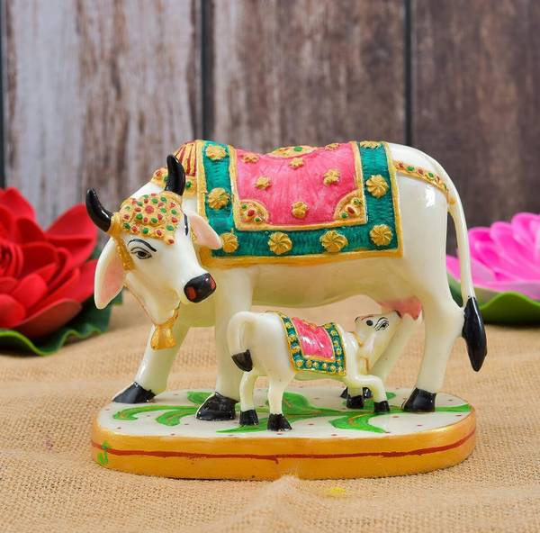 SEVLIYA TRADERS Cow Statue/Showpiece/Murti Gift & Home Dcor (Size - 7x4 Inch) Decorative Showpiece - 17 cm