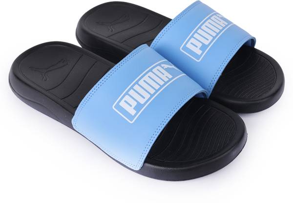 Light blue puma slides top