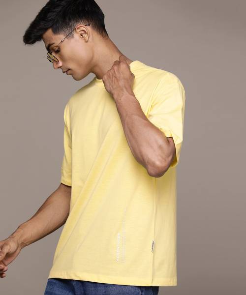 Roadster Solid Men Round Neck Yellow T-Shirt