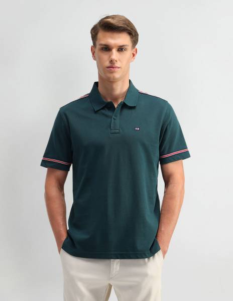 ARROW Solid Men Polo Neck Green T-Shirt