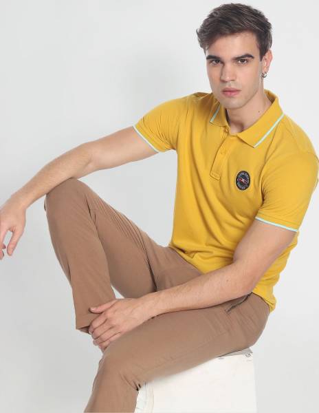 FLYING MACHINE Solid Men Polo Neck Yellow T-Shirt