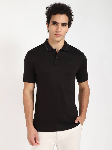 Calvin Klein Jeans Solid Men Polo Neck Black T-Shirt