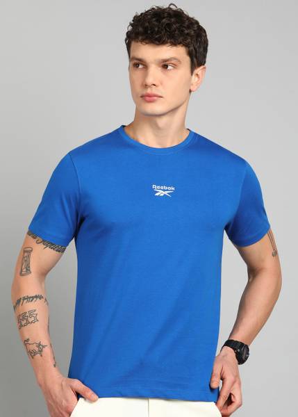 REEBOK Solid Men Round Neck Blue T-Shirt