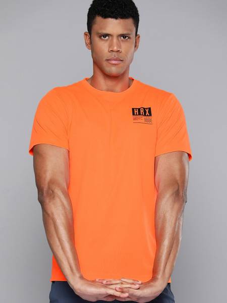 HRX by Hrithik Roshan Solid Men Round Neck Orange T Shirt Price