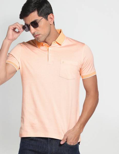 ARROW Solid Men Polo Neck Orange T-Shirt