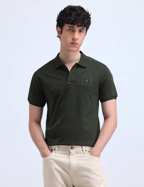 FLYING MACHINE Solid Men Polo Neck Green T-Shirt