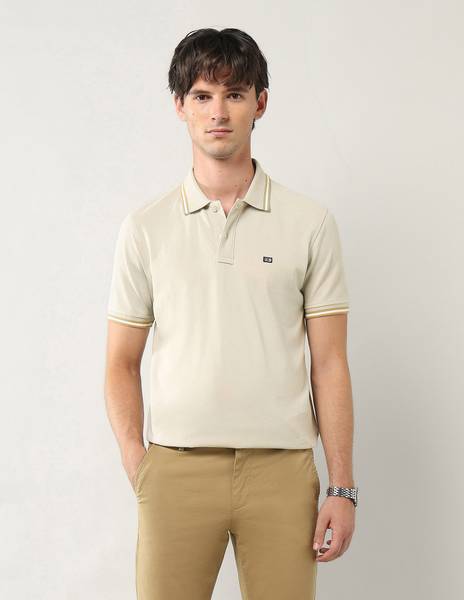 Arrow Sport Solid Men Polo Neck Beige T-Shirt
