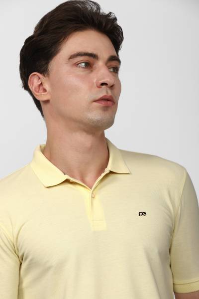 PETER ENGLAND Solid Men Polo Neck Yellow T-Shirt