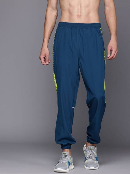 HRX by Hrithik Roshan Solid Men Green Track Pants