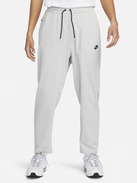 Nike solid men's hotsell grey track pants