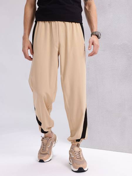 HRX by Hrithik Roshan Solid Men Beige Track Pants