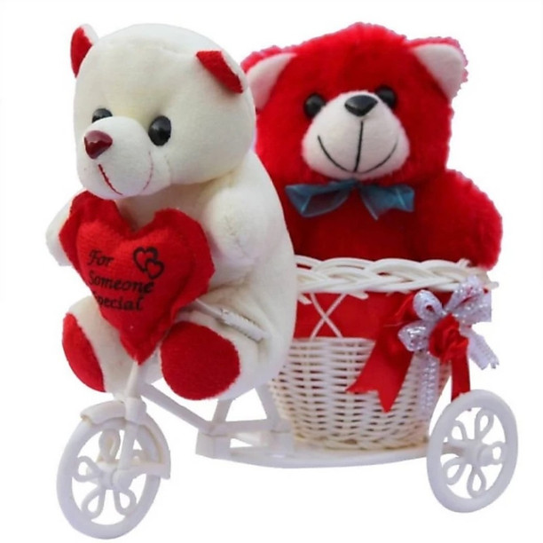 teddy bear with love symbol